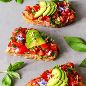  Kayla Itsines Instagram model bruschetta with tomatoes onions basil and avocado 